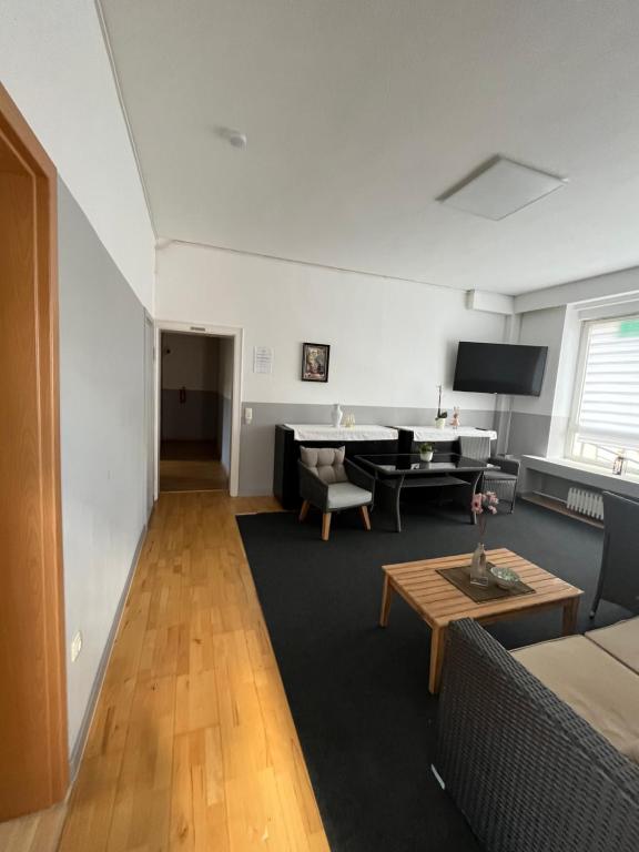 Posezení v ubytování Doppelzimmer-Bad-Kühlschrank-Tv-19