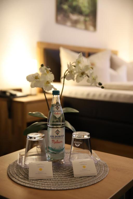 Postel nebo postele na pokoji v ubytování Hotel zur Isar