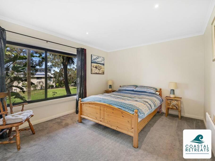 Postel nebo postele na pokoji v ubytování Bayview Retreat Phillip Island