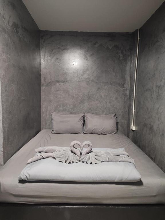 Postel nebo postele na pokoji v ubytování K2N Guesthouse
