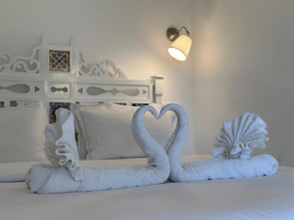 Postel nebo postele na pokoji v ubytování Oceanic - Luxury Boutique Hotel