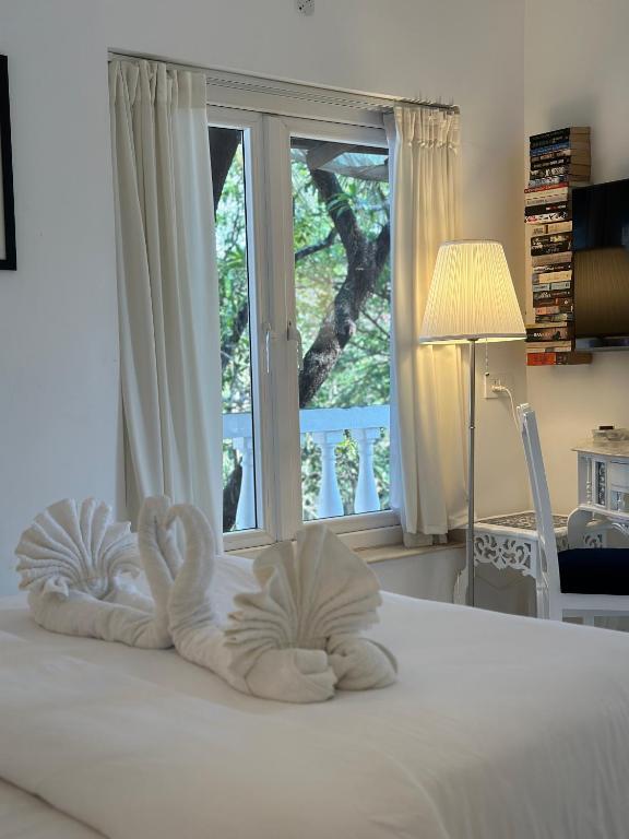 Postel nebo postele na pokoji v ubytování Oceanic - Luxury Boutique Hotel