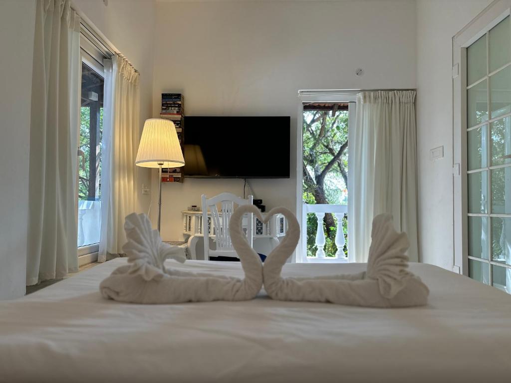 Postel nebo postele na pokoji v ubytování Oceanic - Luxury Boutique Hotel