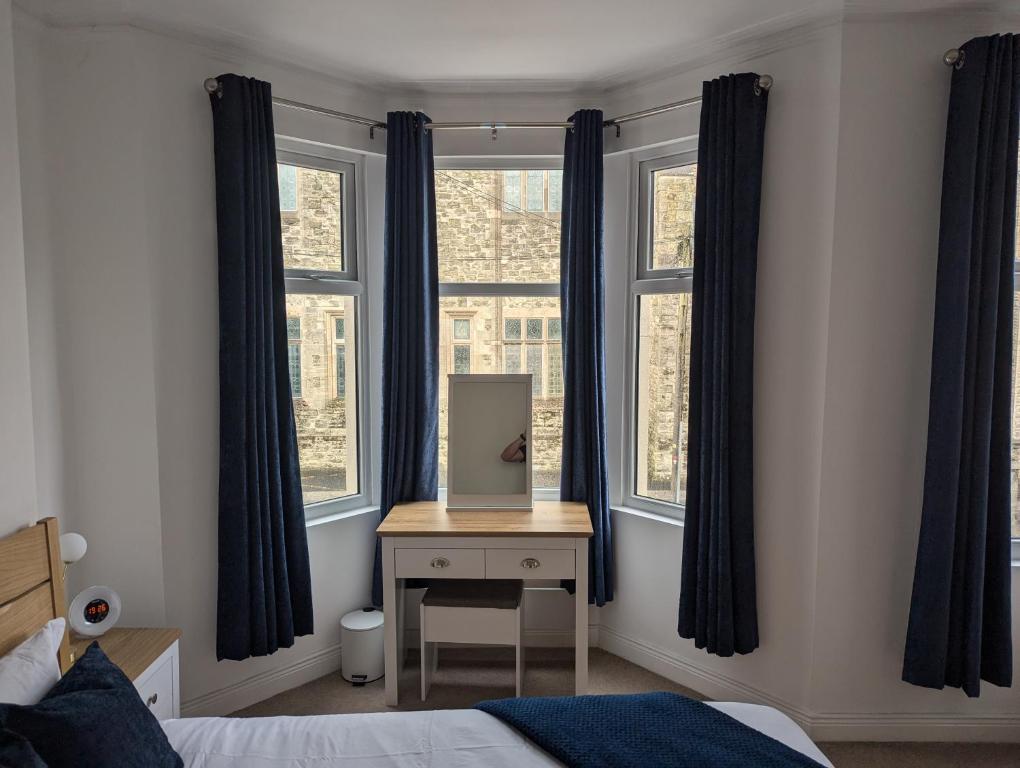 En eller flere senge i et værelse på Prospect House