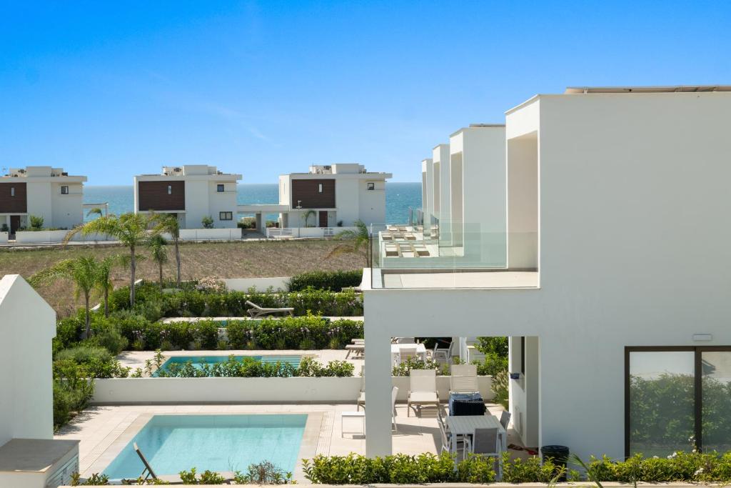 Bazén v ubytování Serenity Waves Villa 26 nebo v jeho okolí