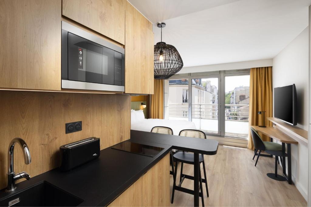 Residence Inn by Marriott Paris Didot Montparnasse - Resim 36