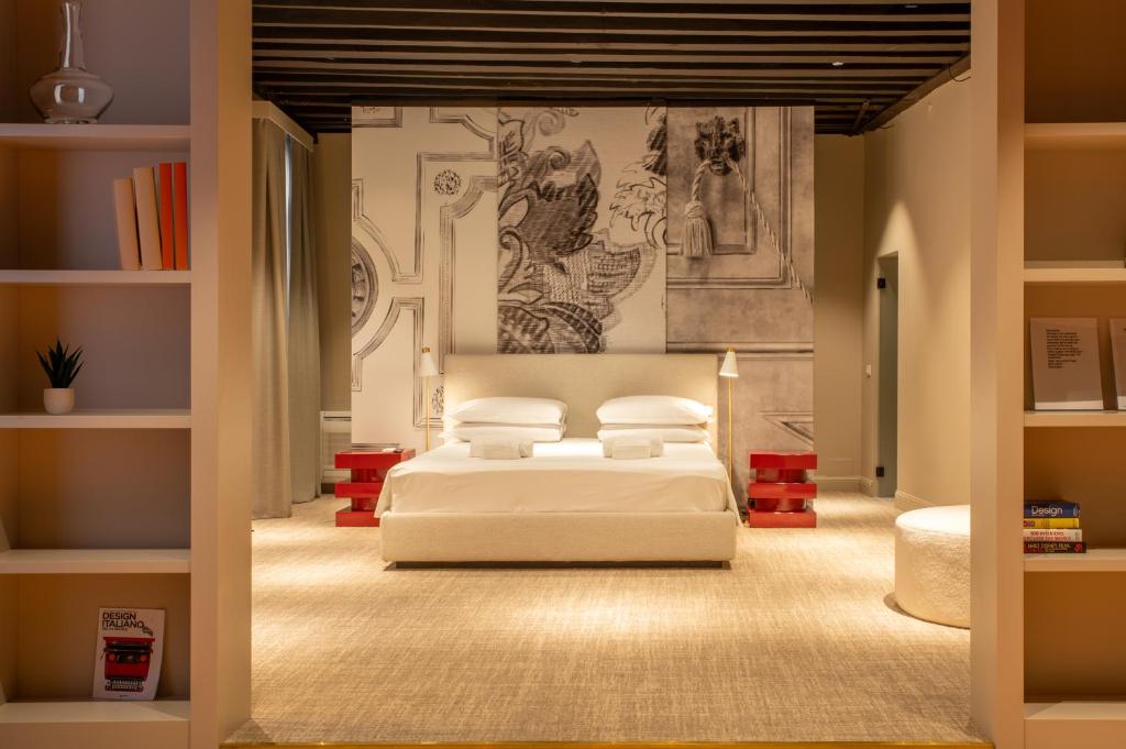 Postel nebo postele na pokoji v ubytování Design Apartment San Marco