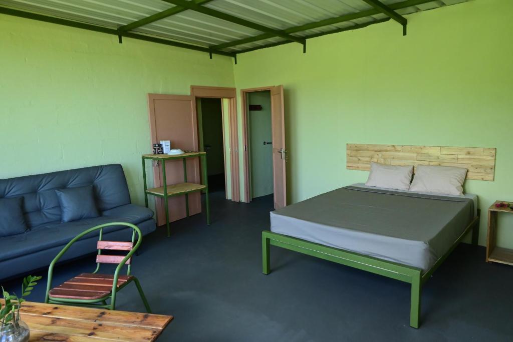 Postel nebo postele na pokoji v ubytování The Green Shack