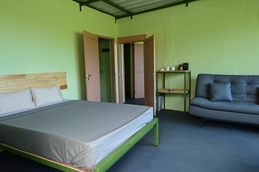 Postel nebo postele na pokoji v ubytování The Green Shack