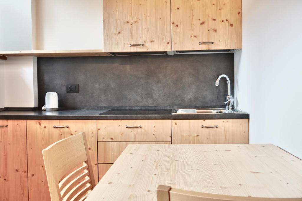 Kuchyň nebo kuchyňský kout v ubytování Hotel Garni Civetta
