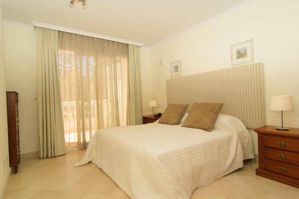 Postel nebo postele na pokoji v ubytování Apartment White Pearl Beach