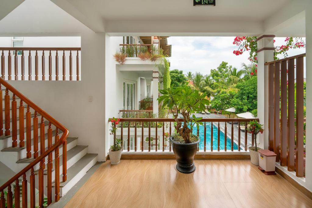 Balkón nebo terasa v ubytování Hoi An Palmy Villa