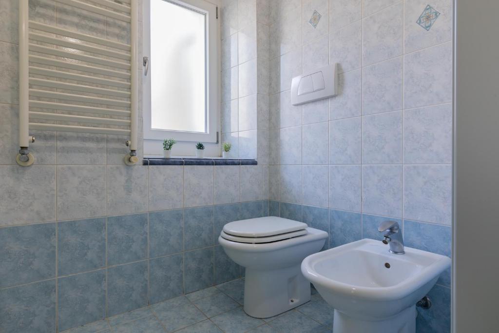 A bathroom at San Salvario Family Apartment by Wonderful Italy