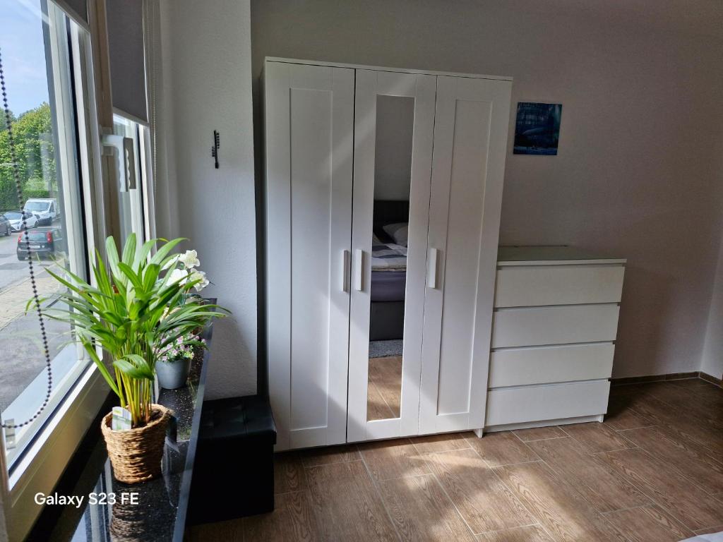 Postel nebo postele na pokoji v ubytování Apartment Bochum