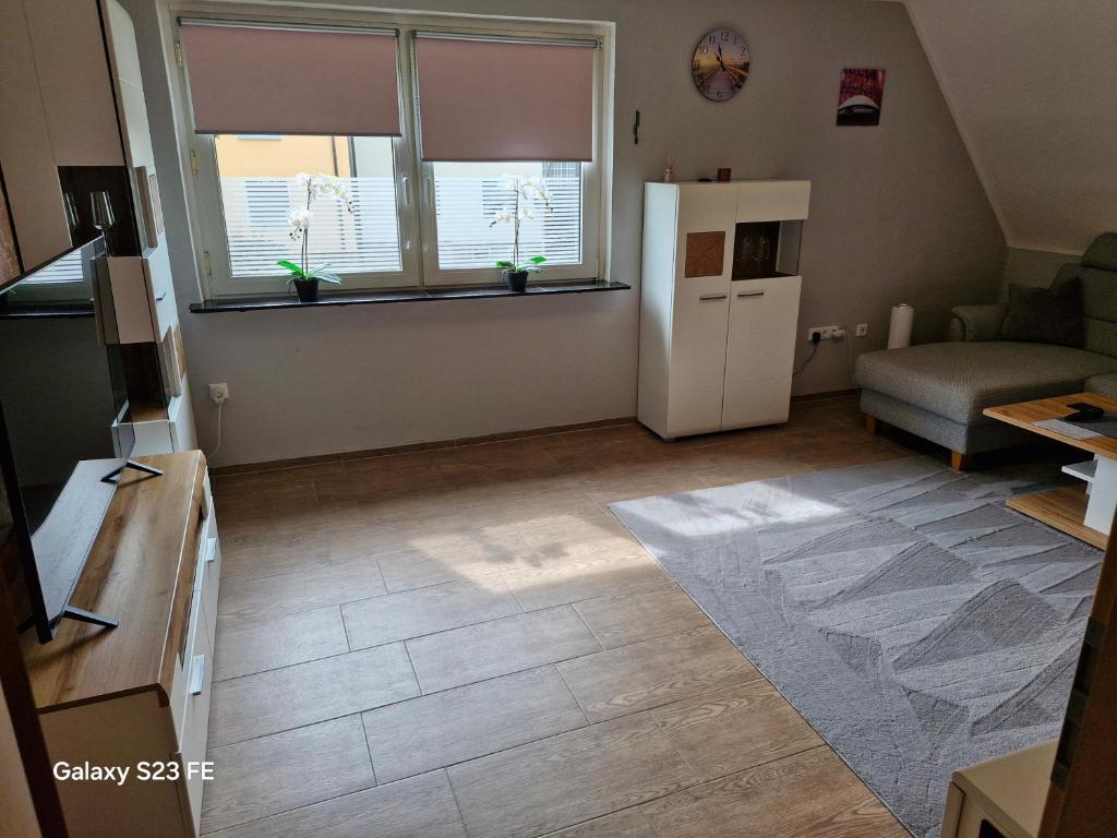 TV a/nebo společenská místnost v ubytování Apartment Bochum