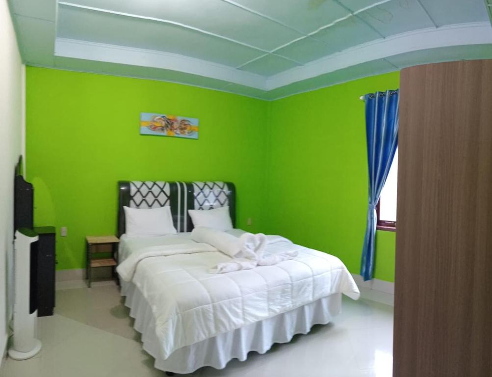 Postel nebo postele na pokoji v ubytování Alice Villa2