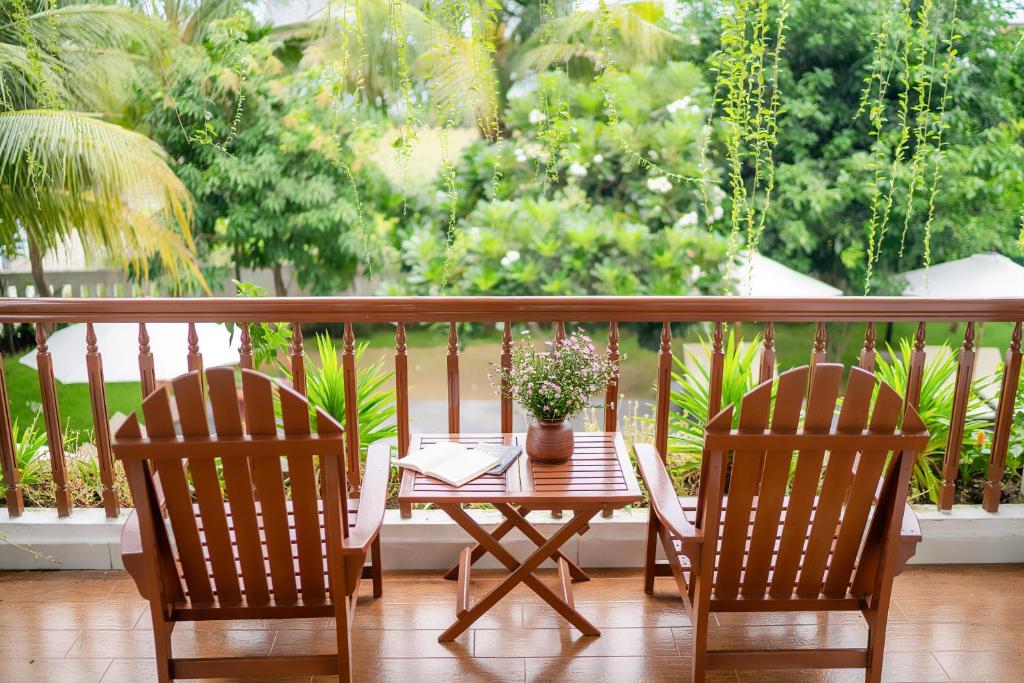 Balkón nebo terasa v ubytování Hoi An Palmy Villa