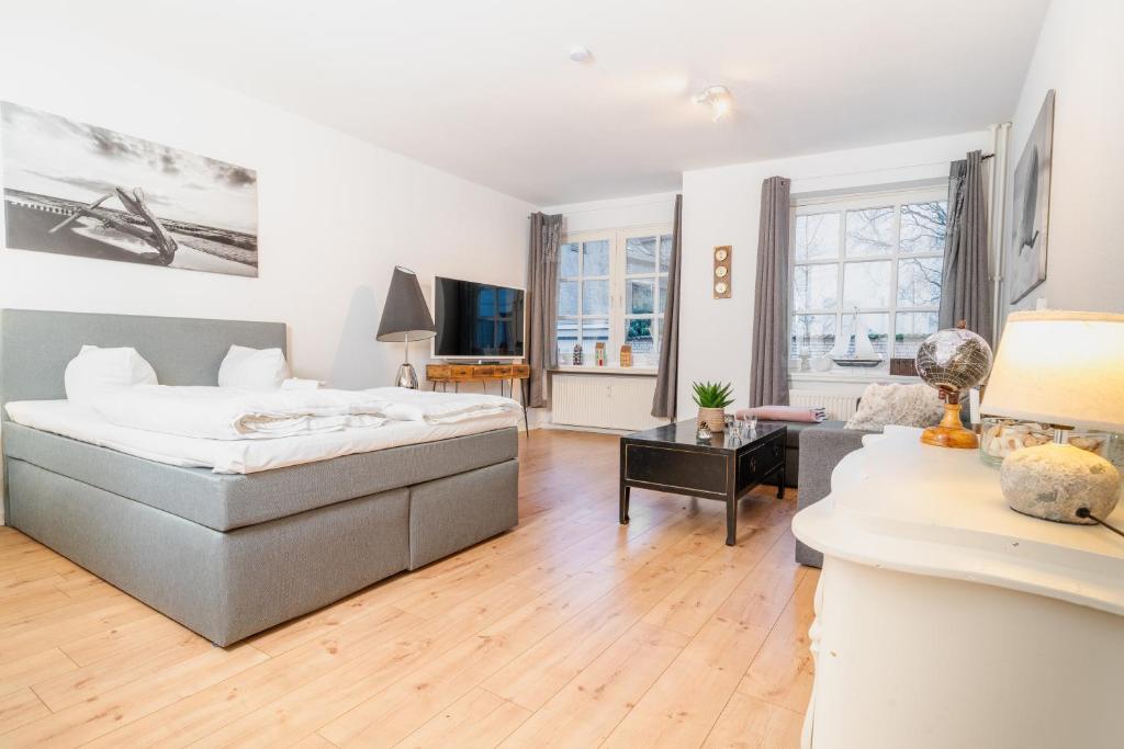 Ένα ή περισσότερα κρεβάτια σε δωμάτιο στο Koje Sansibar