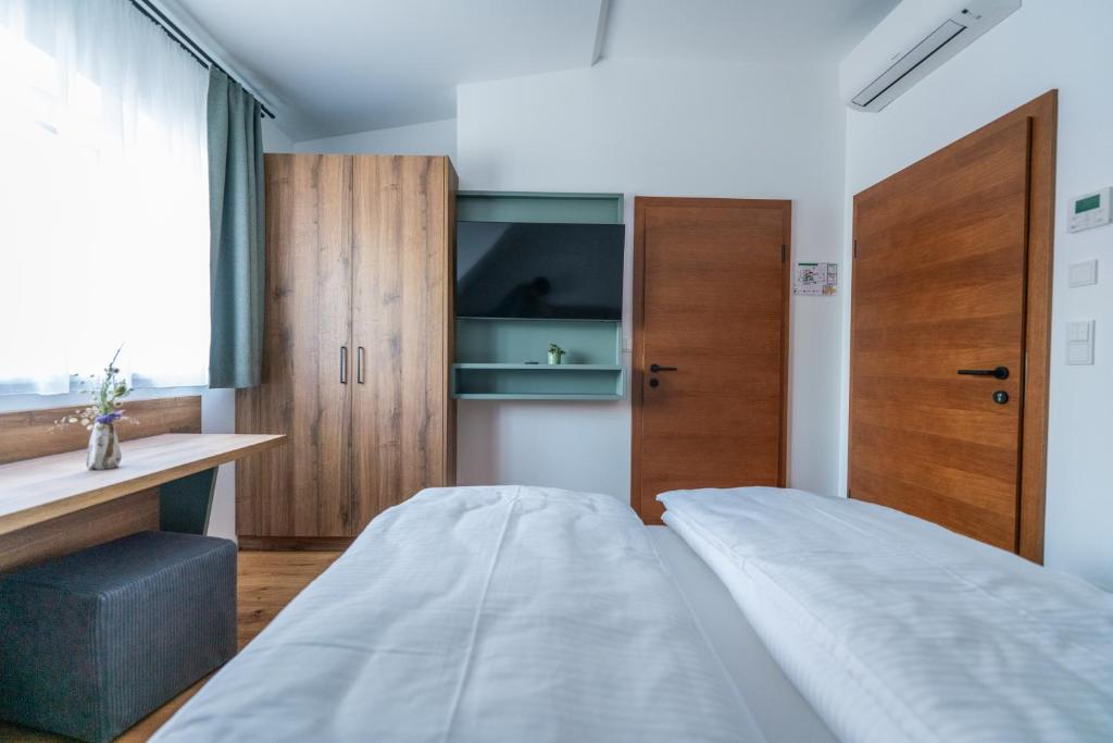 Postel nebo postele na pokoji v ubytování das Ursprung