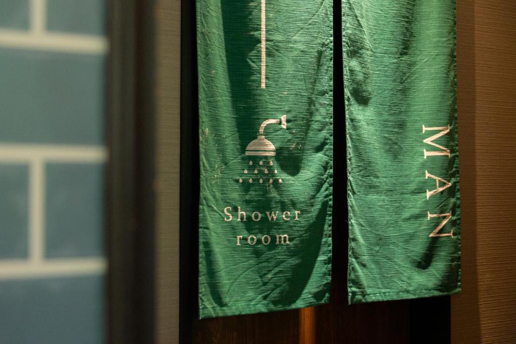 Certifikát, hodnocení, plakát nebo jiný dokument vystavený v ubytování BUNA KUSATSU Onsen Inn