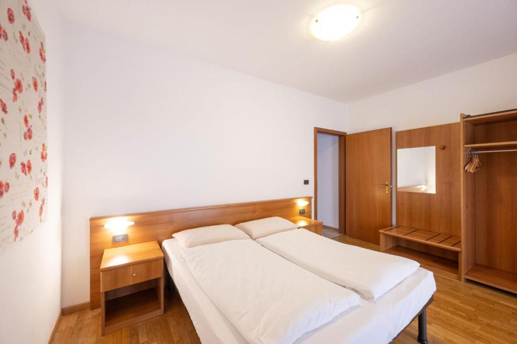 Een bed of bedden in een kamer bij Residence Desiree