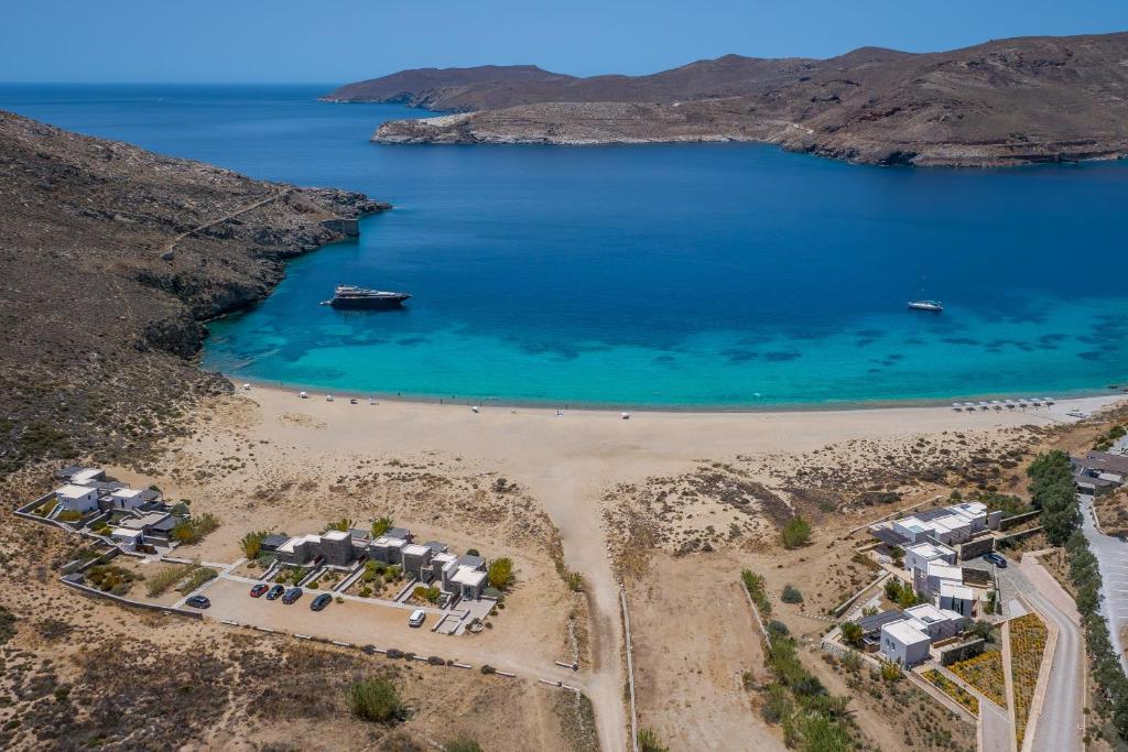 an aerial view of a beach with a boat in the water at Ammoa Beach Residences in Vayiá