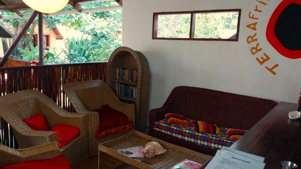 Posezení v ubytování Devocean Eco Adventure Lodge