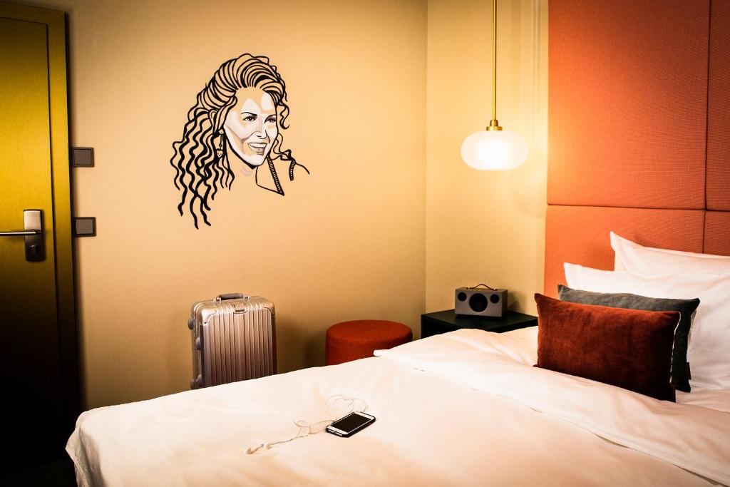 Postel nebo postele na pokoji v ubytování Design-Hotel JAMS