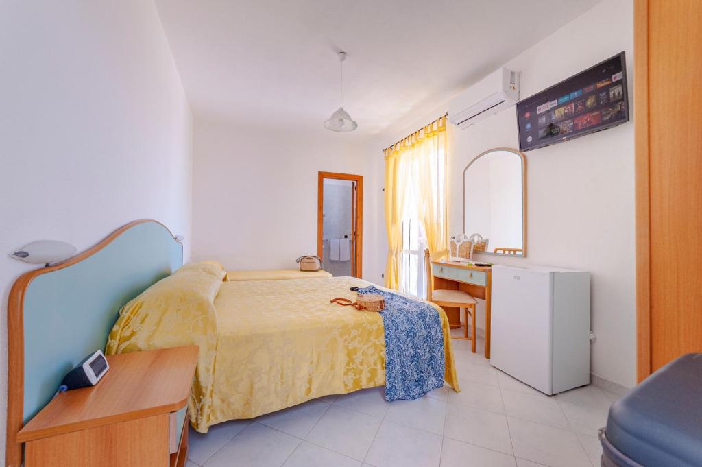 Postel nebo postele na pokoji v ubytování Poggio Del Sole