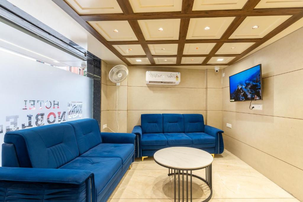 Posezení v ubytování Hotel Noble Inn, Ahmedabad