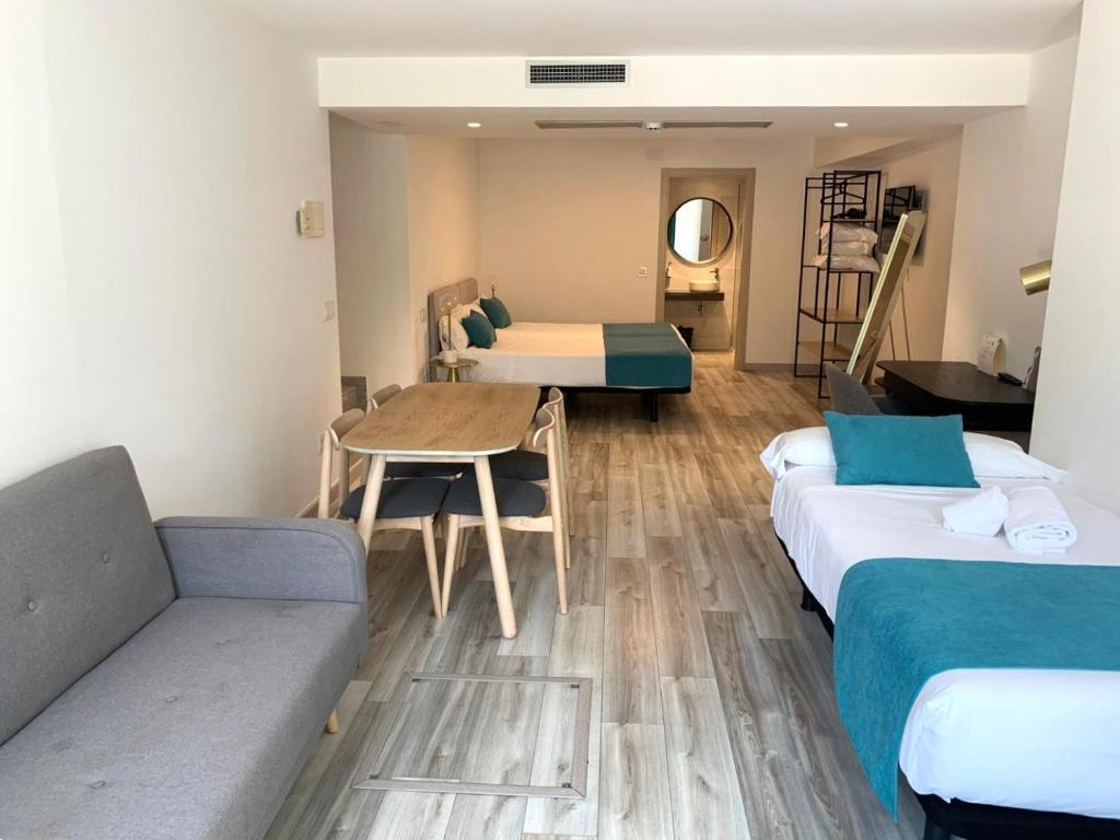 Postel nebo postele na pokoji v ubytování Hotel Pombal Rooms