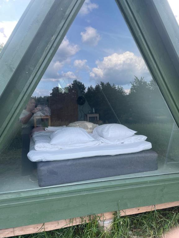 Postel nebo postele na pokoji v ubytování Rörums Gårdshotell
