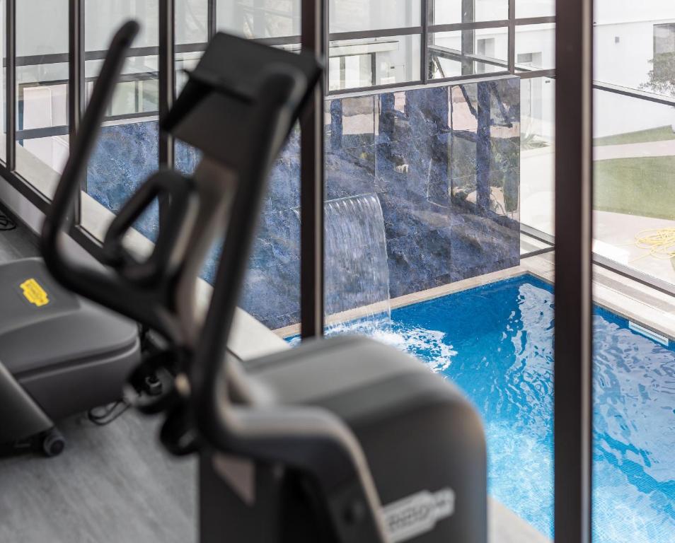 Fitness centrum a/nebo fitness zařízení v ubytování Résidence Evolo chambre d'hôtes