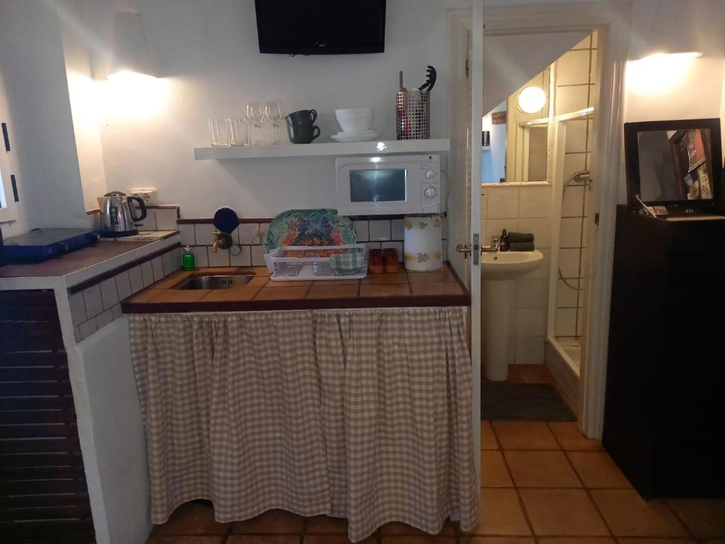 Kuchyň nebo kuchyňský kout v ubytování Cueva con Vista