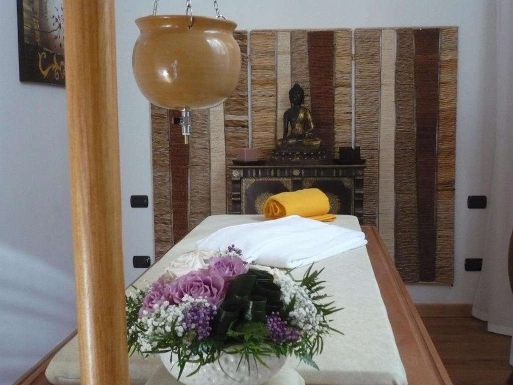 Postel nebo postele na pokoji v ubytování Hotel Marco Polo