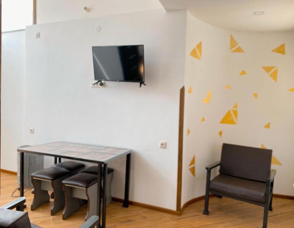 TV a/nebo společenská místnost v ubytování Green Garden B&B