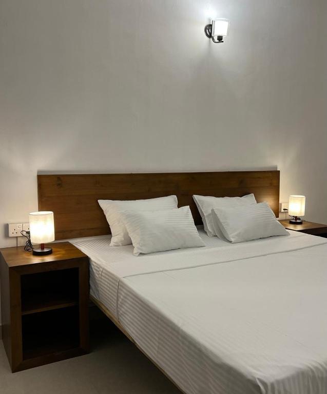 Postel nebo postele na pokoji v ubytování Pavlin Lodge