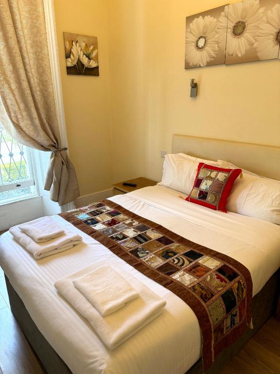 Postel nebo postele na pokoji v ubytování ABC Hyde Park Hotel
