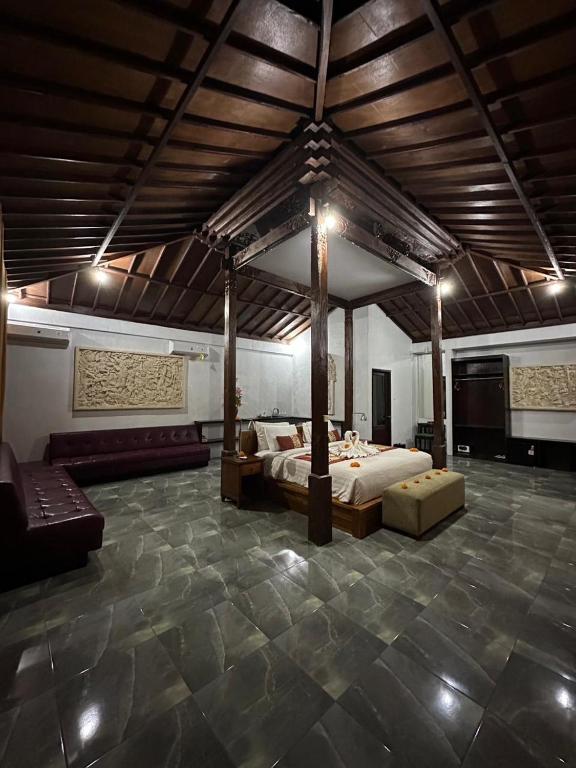 Posezení v ubytování Kampoeng Joglo Abangan Ubud