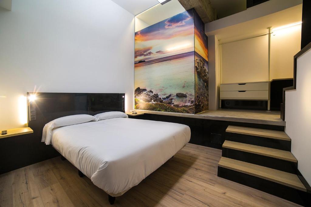 Postel nebo postele na pokoji v ubytování Zerupe Hotel