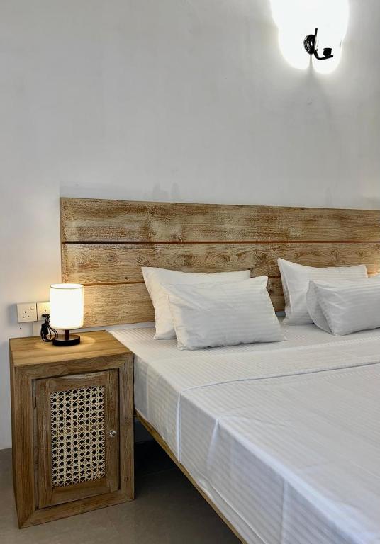 Postel nebo postele na pokoji v ubytování Pavlin Lodge