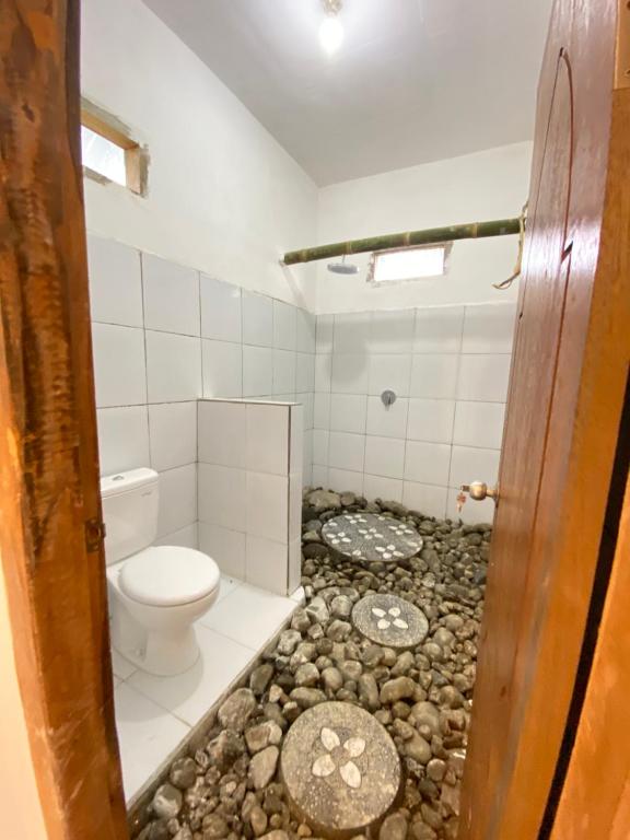 Koupelna v ubytování Opik Homestay Tete Batu