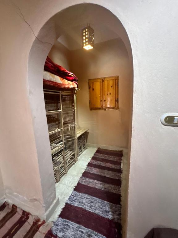 Postel nebo postele na pokoji v ubytování Nour El Waha Hotel