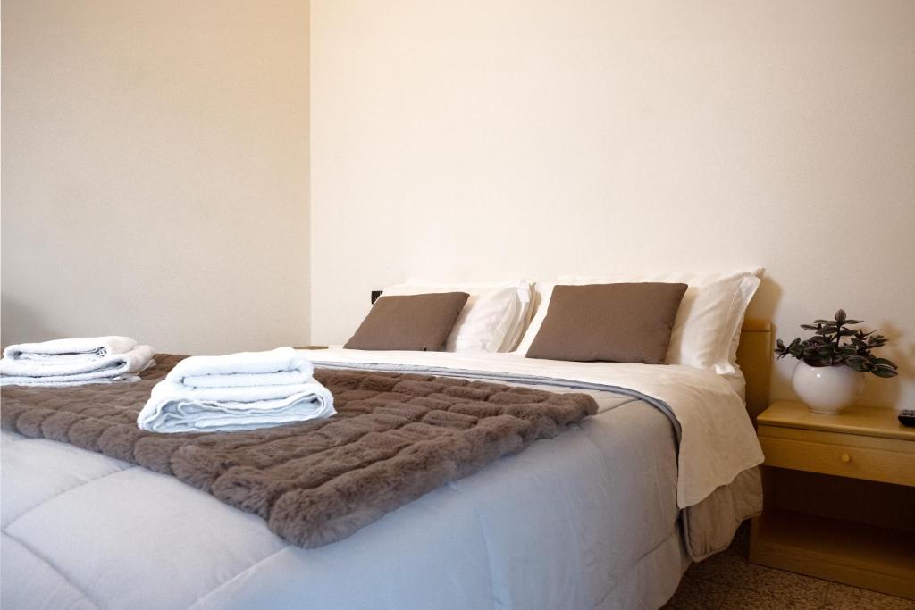Postel nebo postele na pokoji v ubytování Albergo Trattoria Speranza