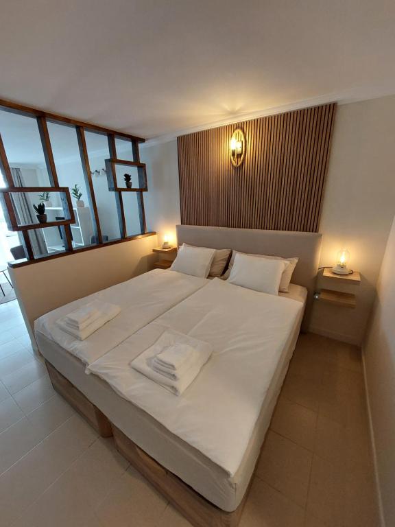 En eller flere senge i et værelse på Canary Sun Apartment