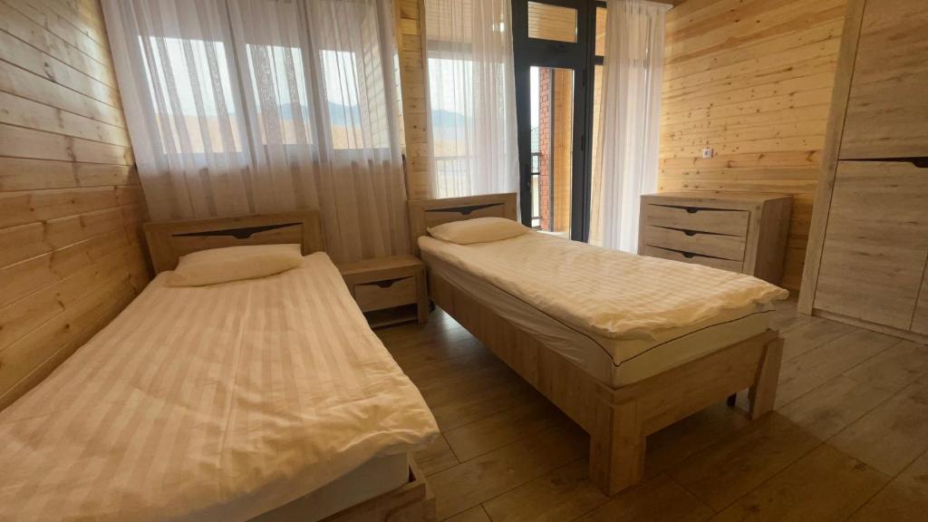 Postel nebo postele na pokoji v ubytování Guest house SHAM