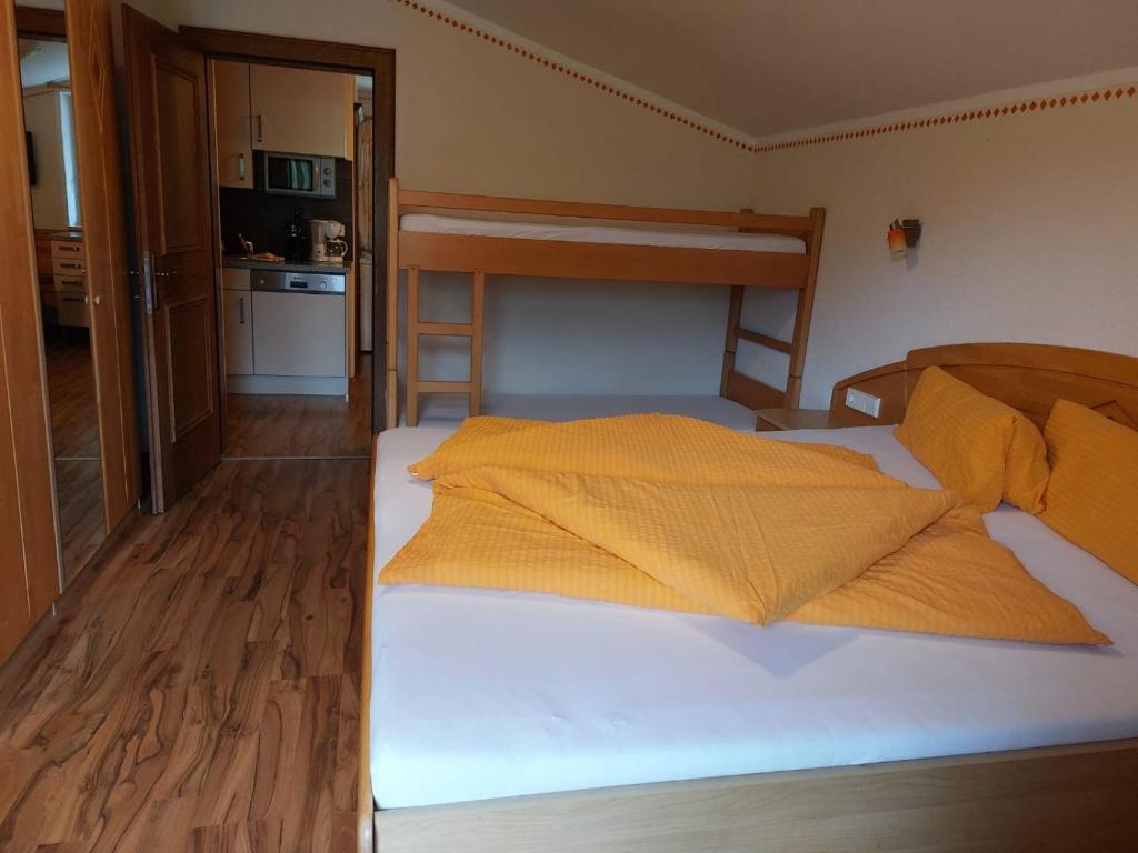 Posteľ alebo postele v izbe v ubytovaní Appartements am See