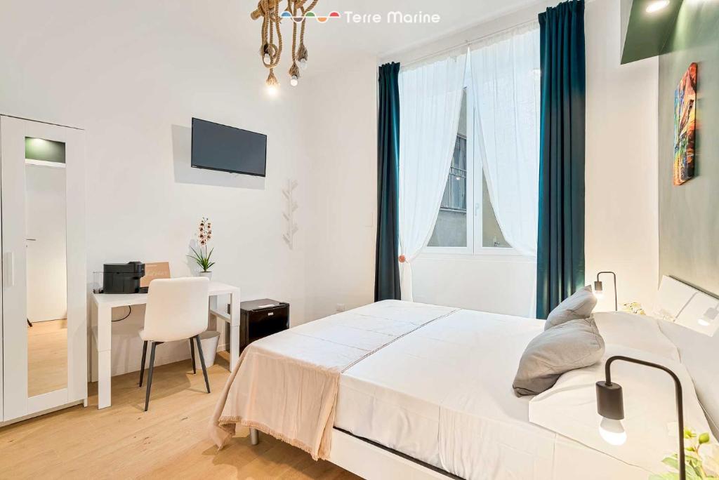 Postel nebo postele na pokoji v ubytování 5 Terre Central, TerreMarine
