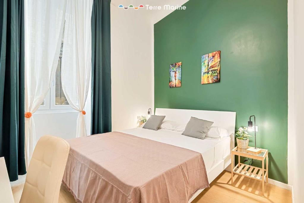 Postel nebo postele na pokoji v ubytování 5 Terre Central, TerreMarine
