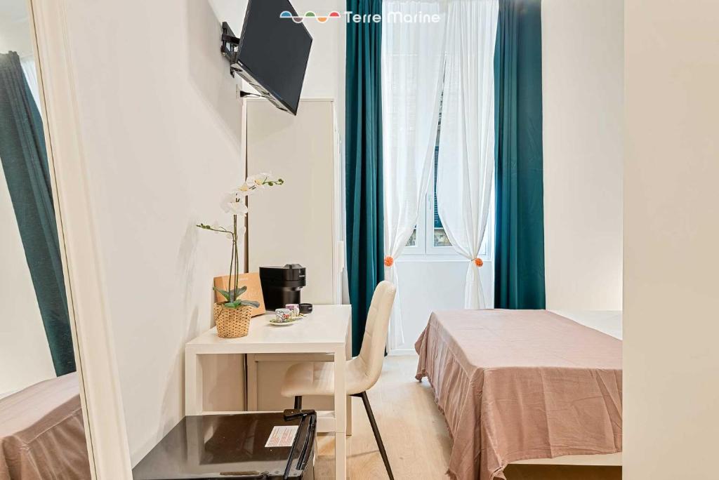 Postel nebo postele na pokoji v ubytování 5 Terre Central, TerreMarine